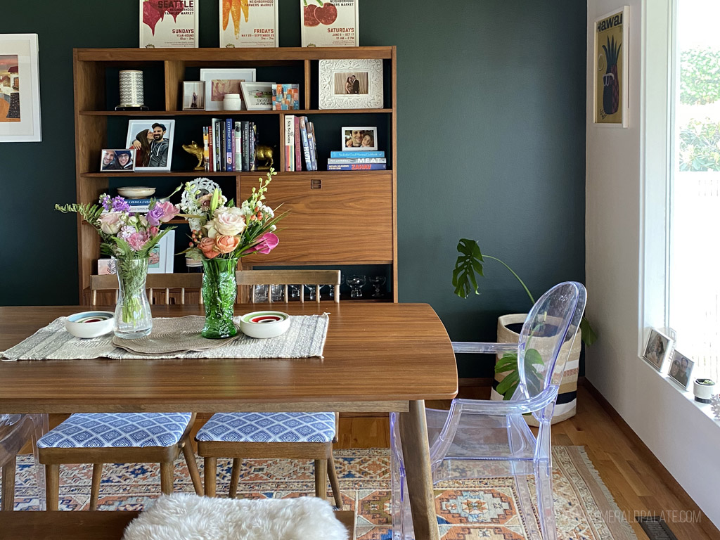 dining room with green wall and vintage furniture