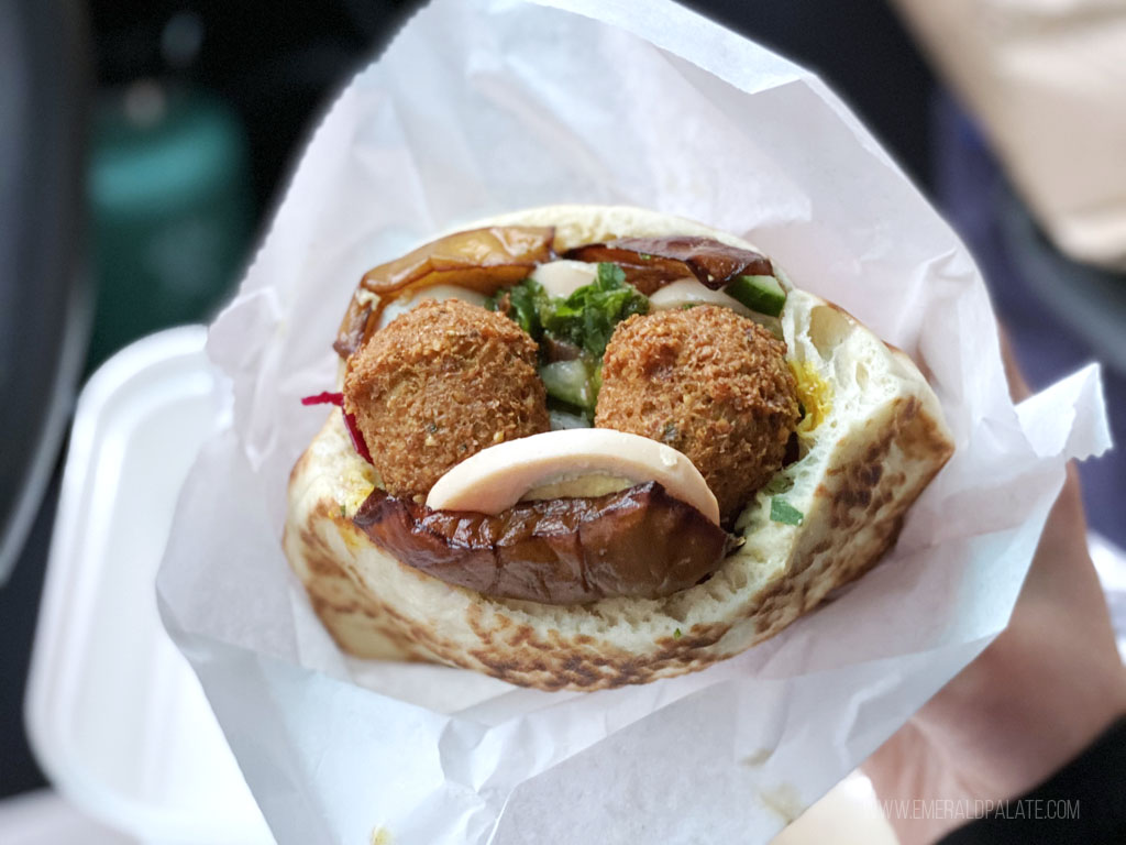 sabich sandwich with falafel from a Mediterranean food in Seattle restaurant