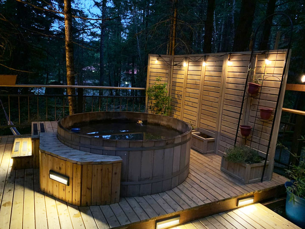 cedar outdoor hot tub at a romantic airbnb Washington state