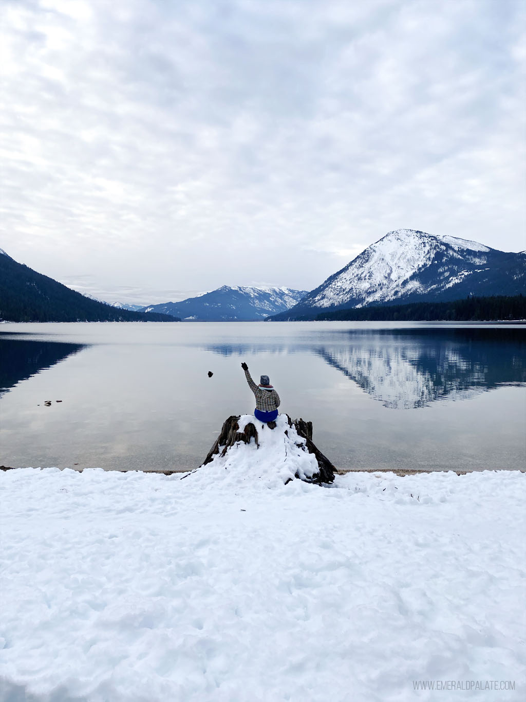 woman sitting in front of Lake Wenatchee State Park