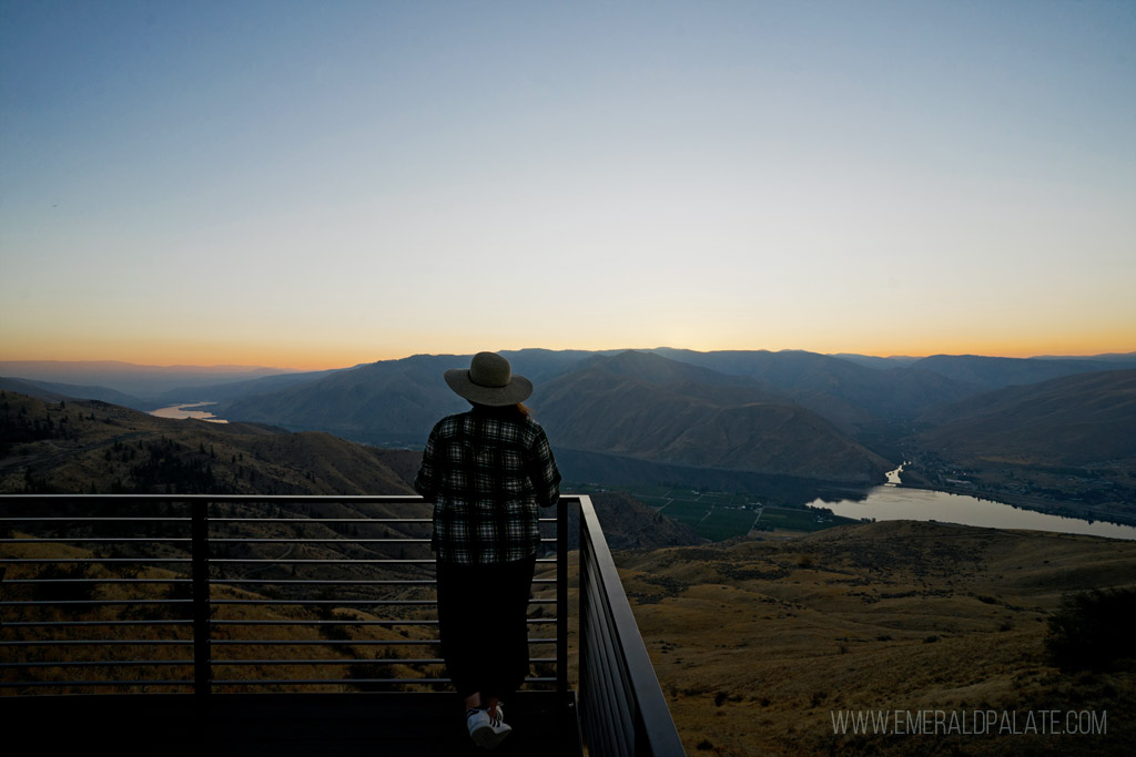 woman enjoying valley views at sunset at one of the most romantic Airbnbs in Washington state