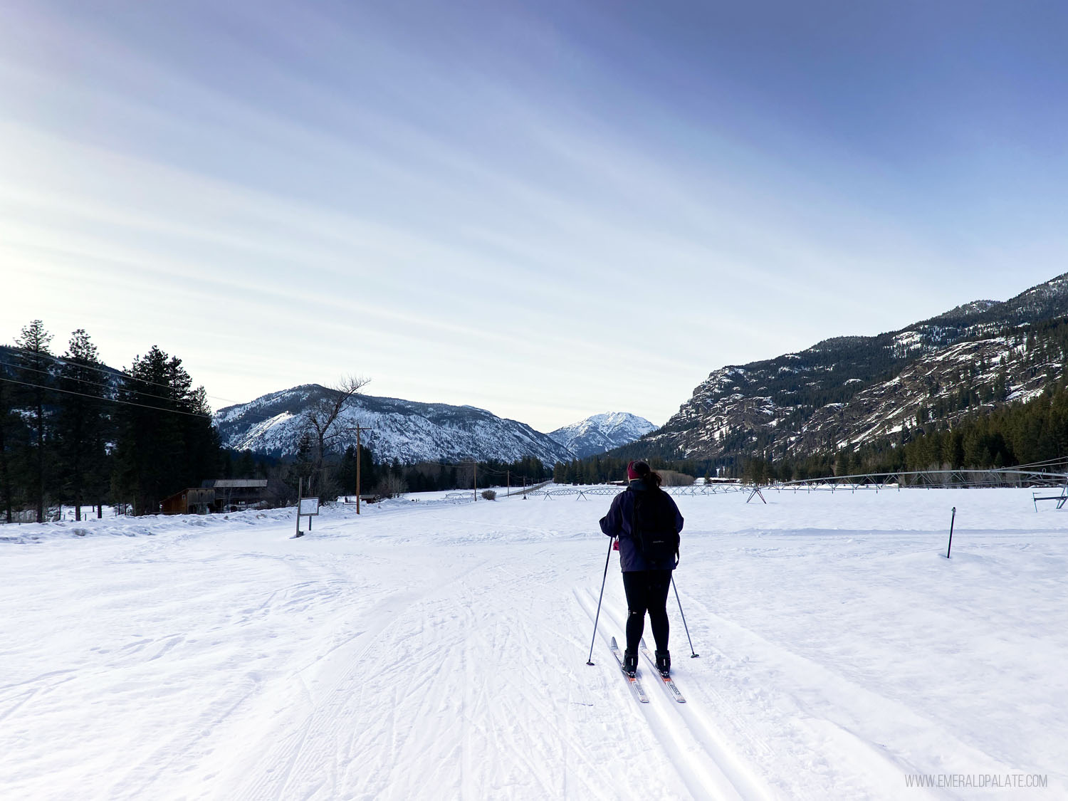 woman cross country skiing in Methow Valley, WA