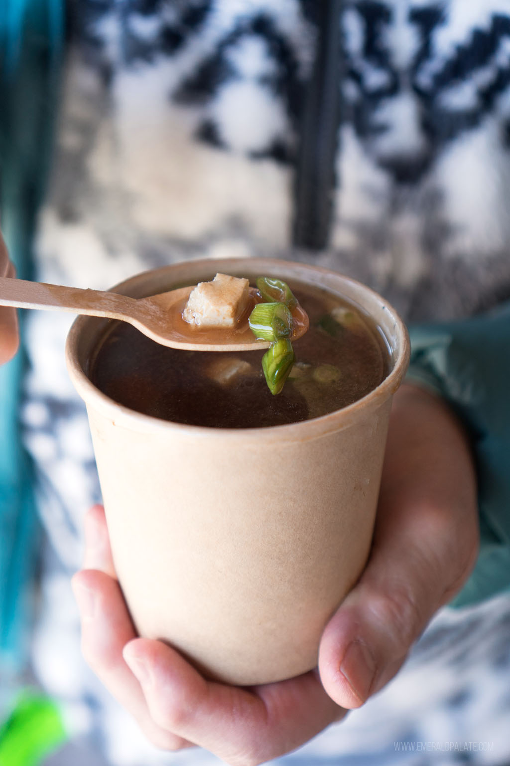 person holding spoonful of soup from a restaurant in Winthrop, WA