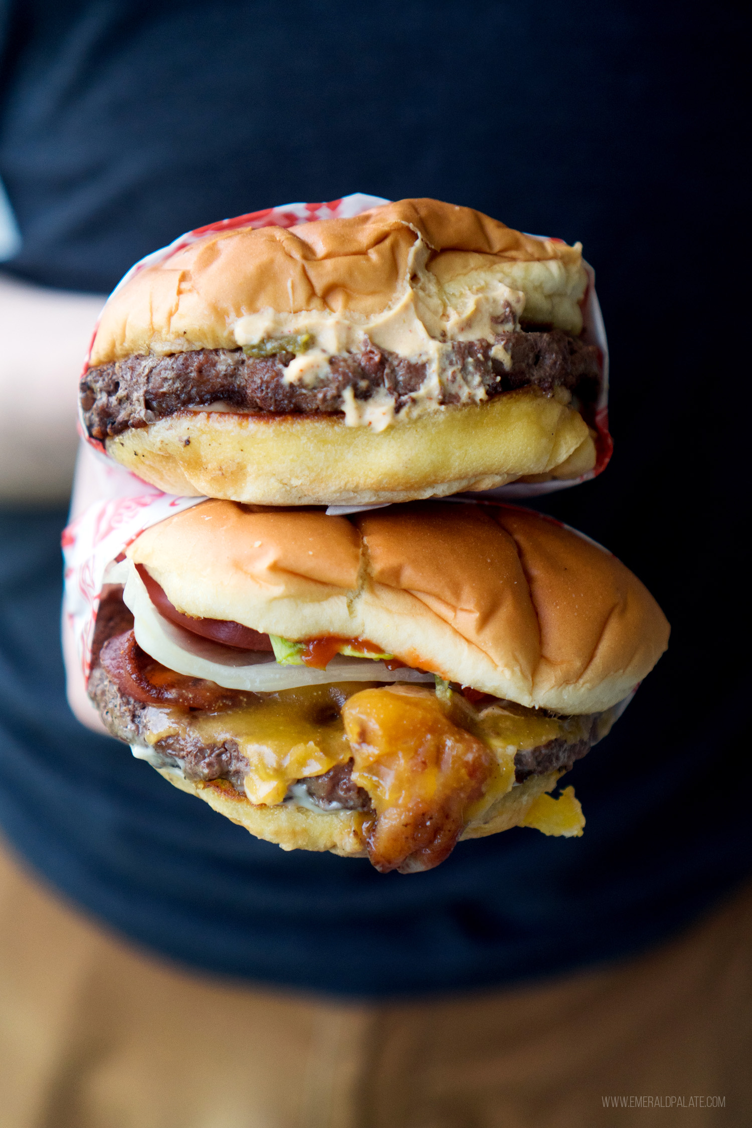 two drive-in style Seattle burgers stacked