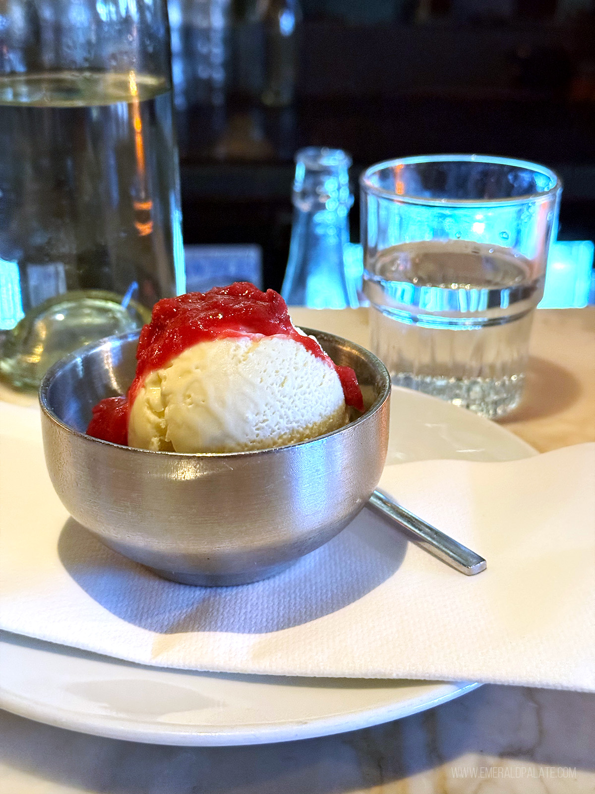 hard serve ice cream topped with fruit compote
