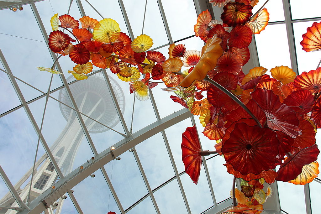 view of space needle from inside atrium of Chihuly Glass Museum in Seattle