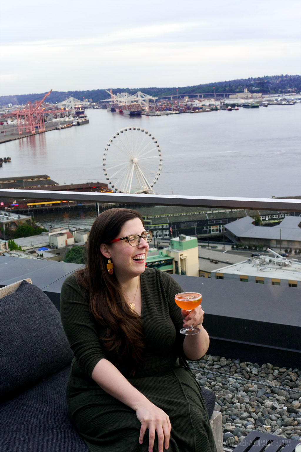 women enjoying cocktail on one of the best rooftop bars in Seattle