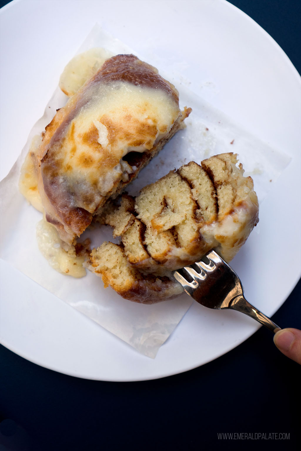 cinnamon roll cut in half from a place to eat in Eugene, Oregon