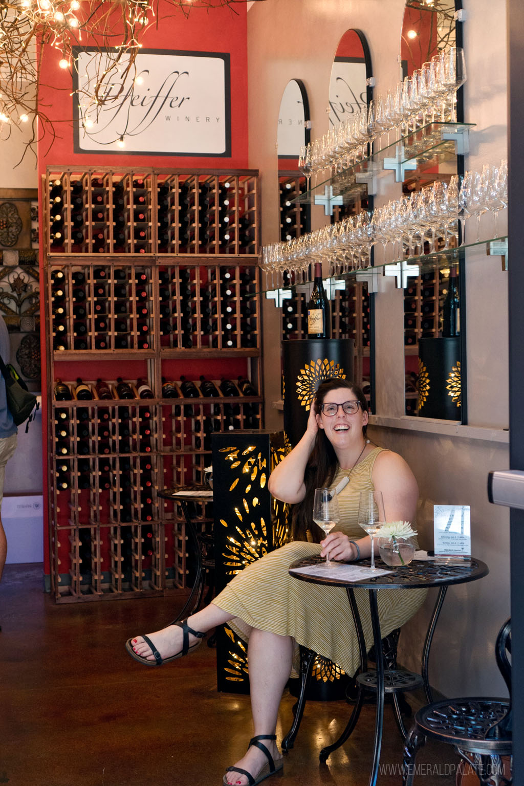 woman wine tasting at 5th Street Public Market in Eugene, Oregon