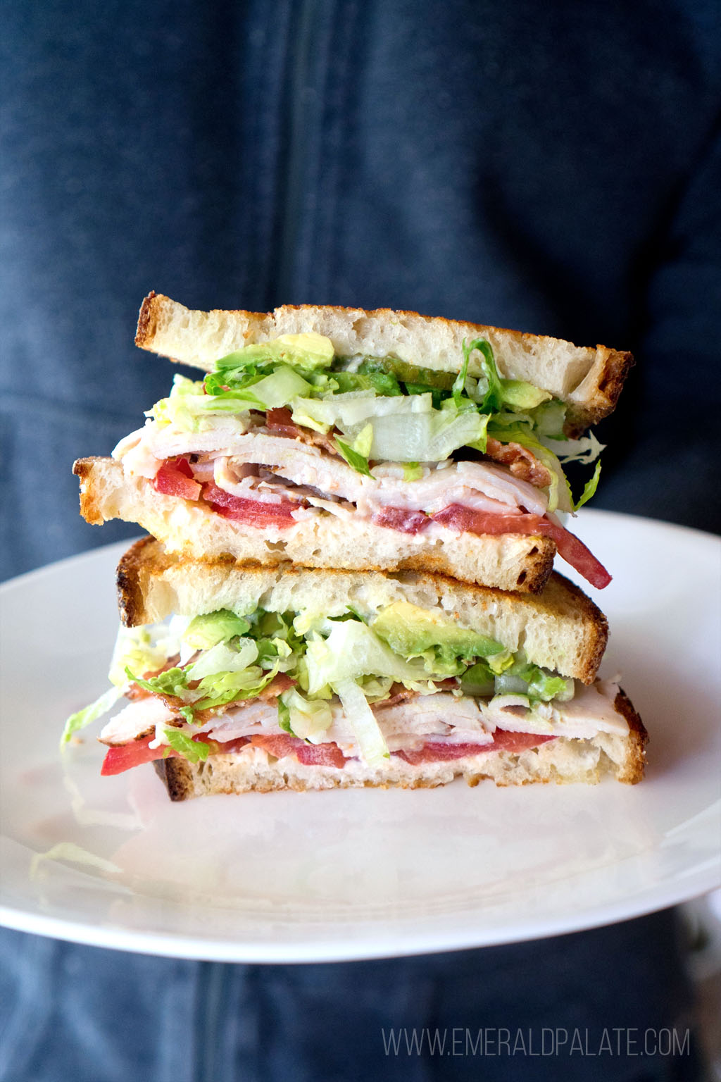 two slices of a BLT stacked on top of each other