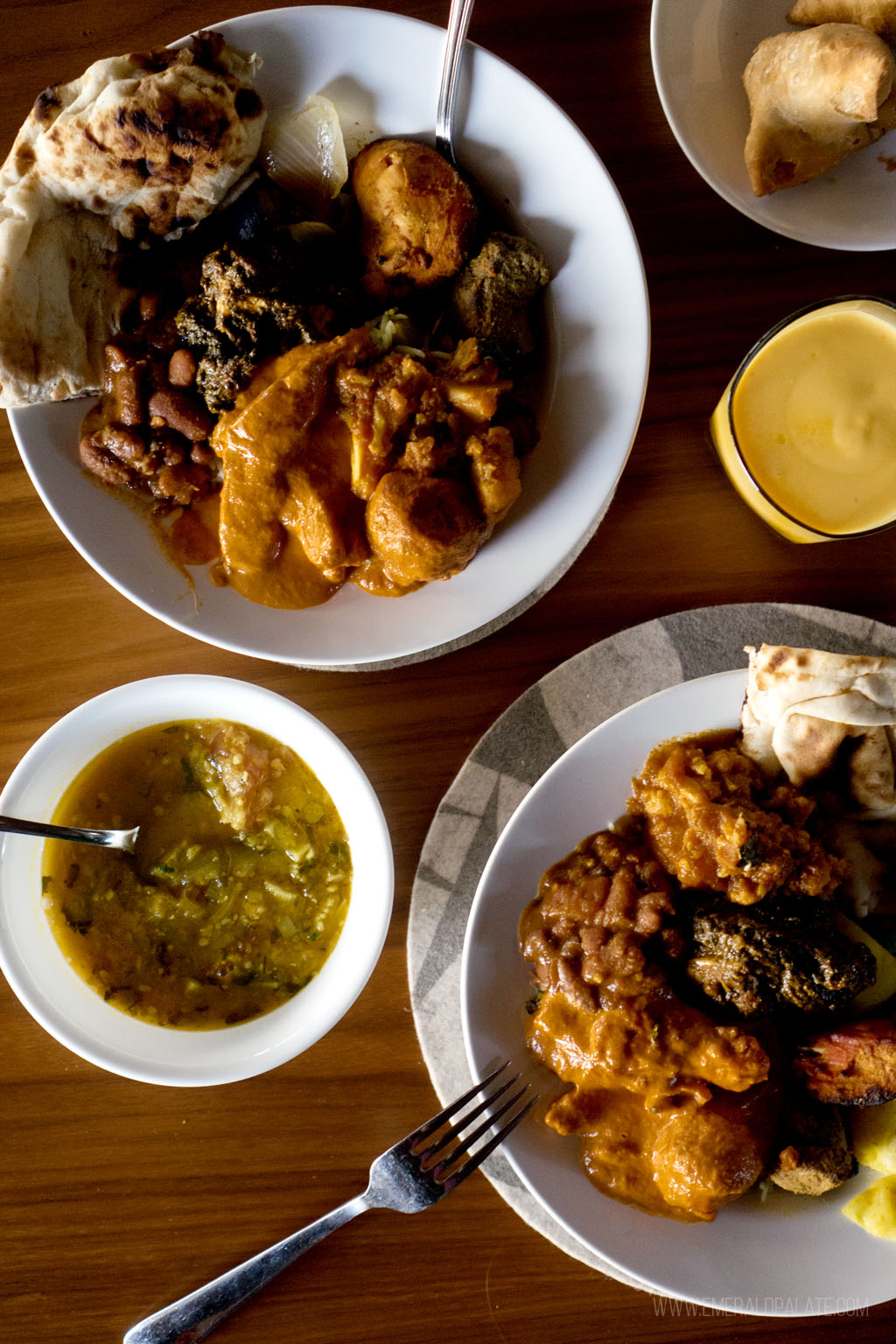 table spread of must try Indian food in Seattle