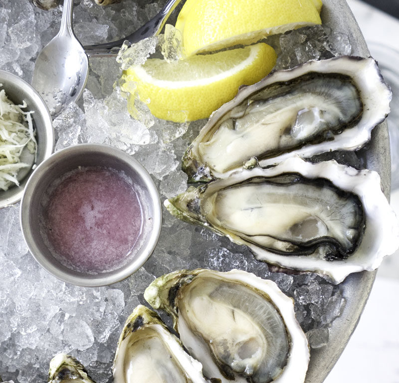 platter of oysters on the half shell from one of the best oyster restaurants in Seattle