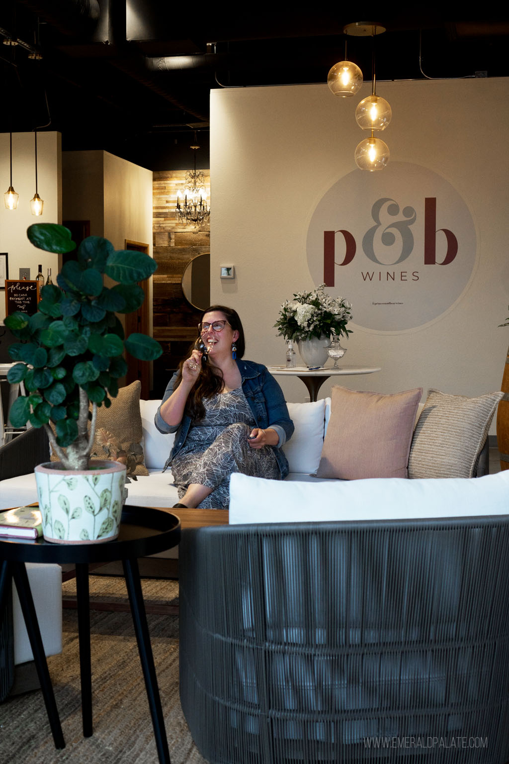 woman enjoying wines from one of the best Seattle wine shops