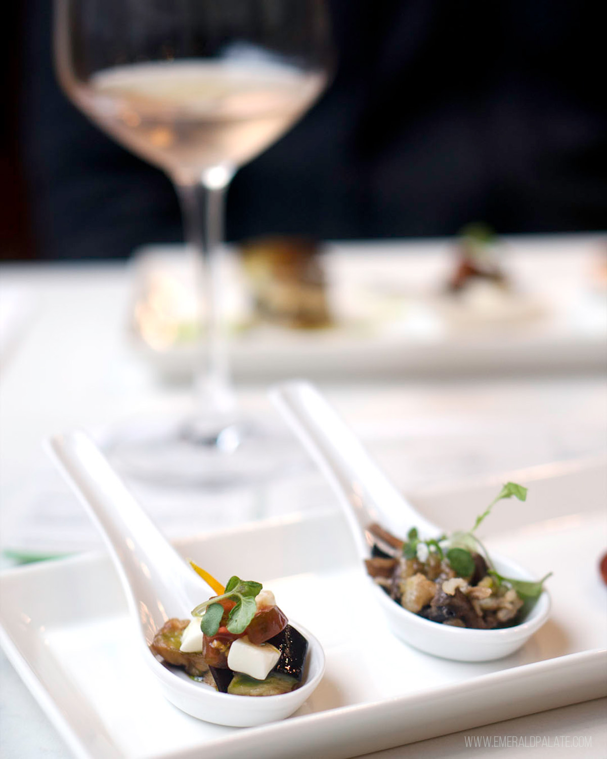 bites in spoons paired with wine at a winery in Seattle