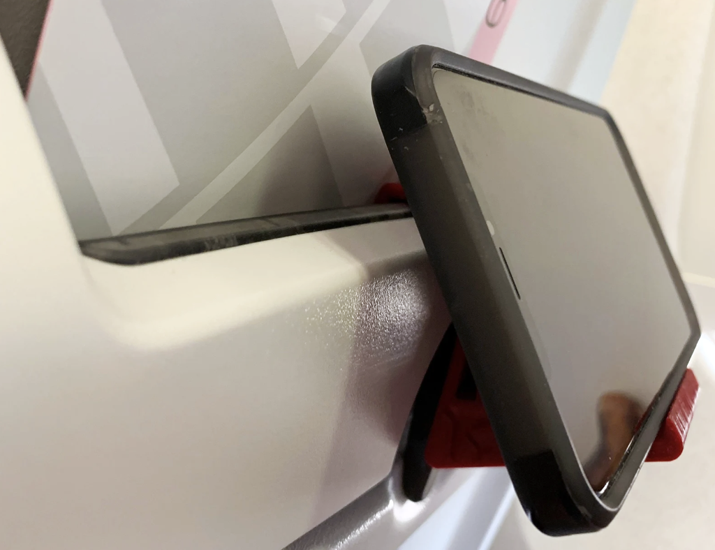 phone stand for a plane, one of the most unique travel gifts