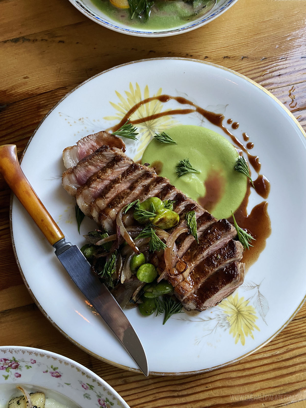 steak at one of the best Willamette Valley restaurants with fava bean and jus