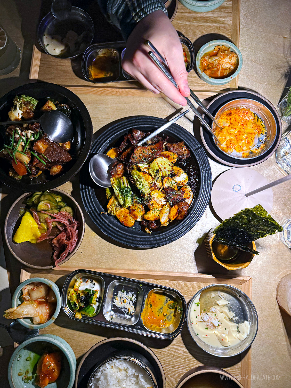 table full of Korean food at a Portland restaurant