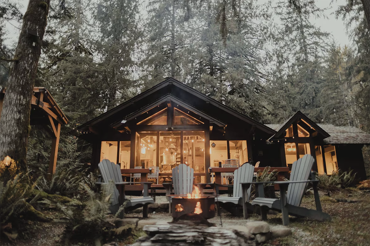 modern winter cabin in Washington state tucked in the woods
