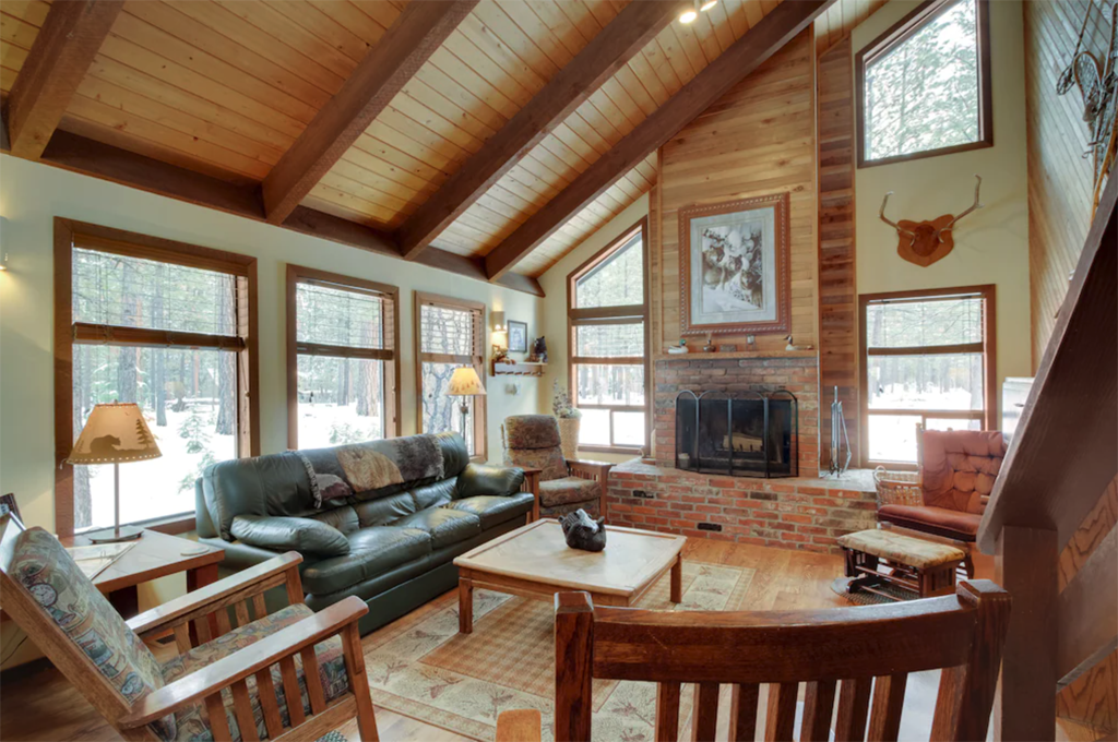 cozy cabin with tall beamed ceiling, one of the best winter cabins in Oregon 