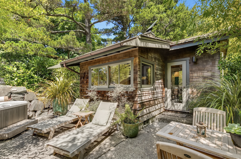 beach cabin in OR with lounge chairs at one of the best winter cabins in Oregon at a resort
