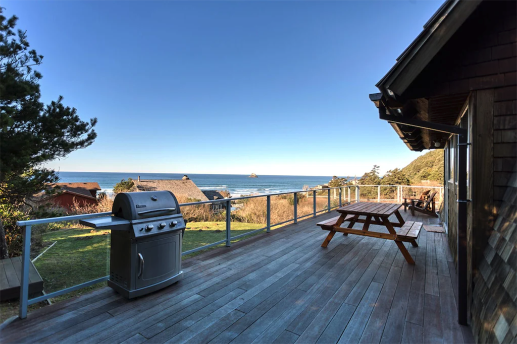 view of Oregon Coast sea stacks from the deck of a cabin