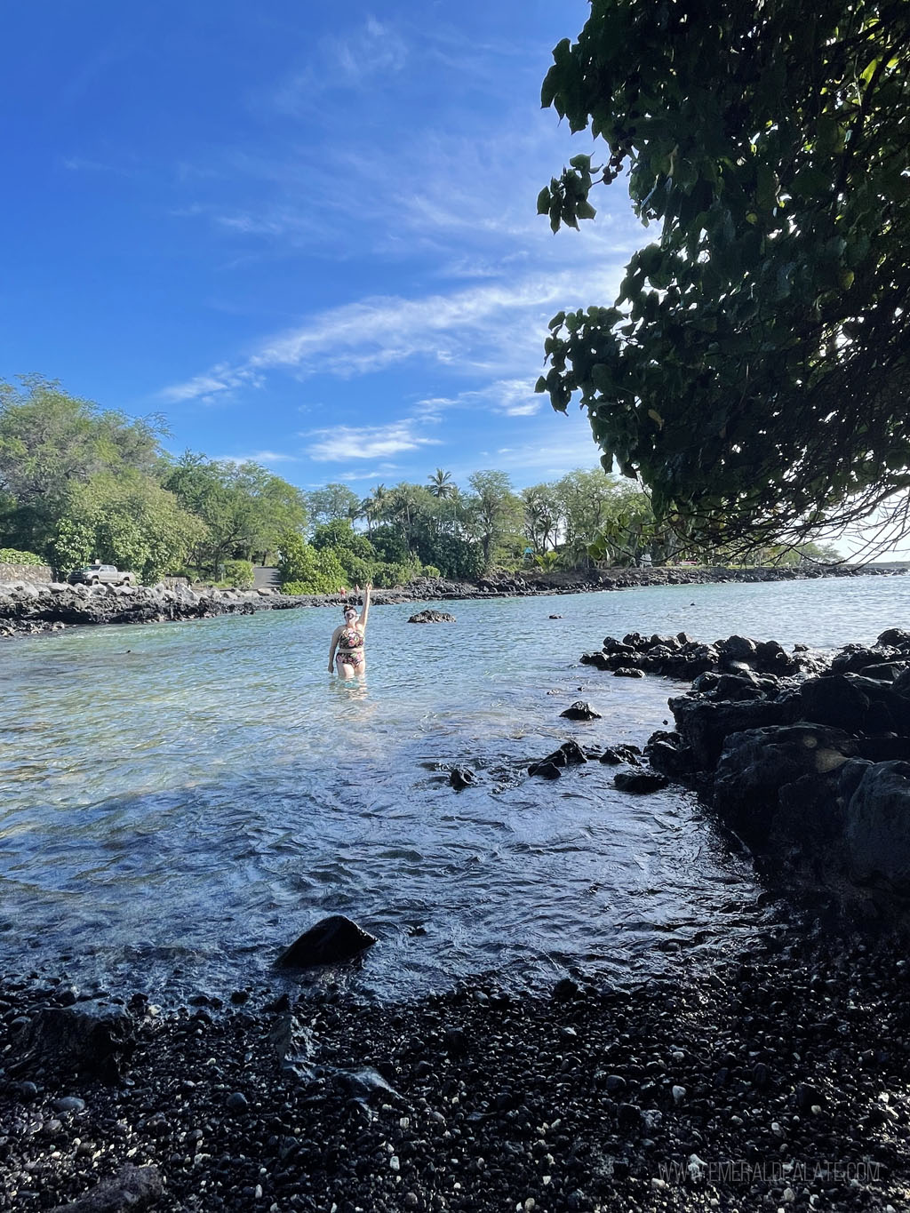 woman snorkeling in a cove