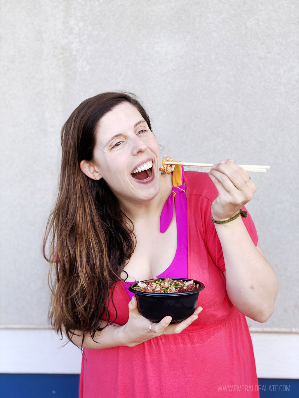 woman eating poke where the locals eat in Maui