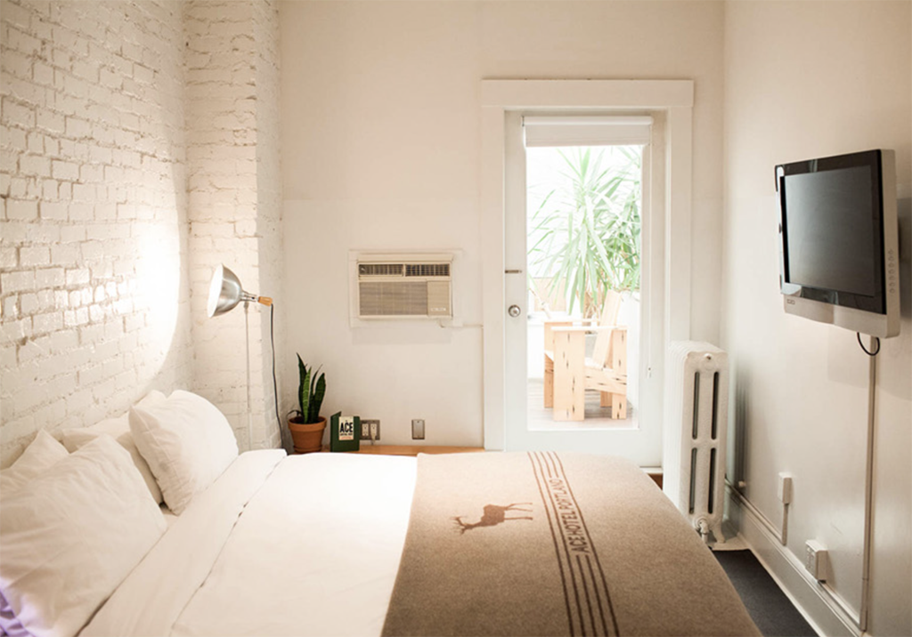 inside a bedroom at Ace Hotel, one of the green hotels in Seattle