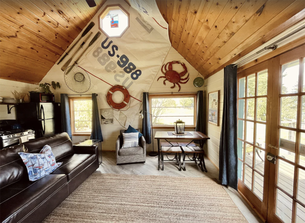 inside a Washington coast cabin with crabs and sails on the walls