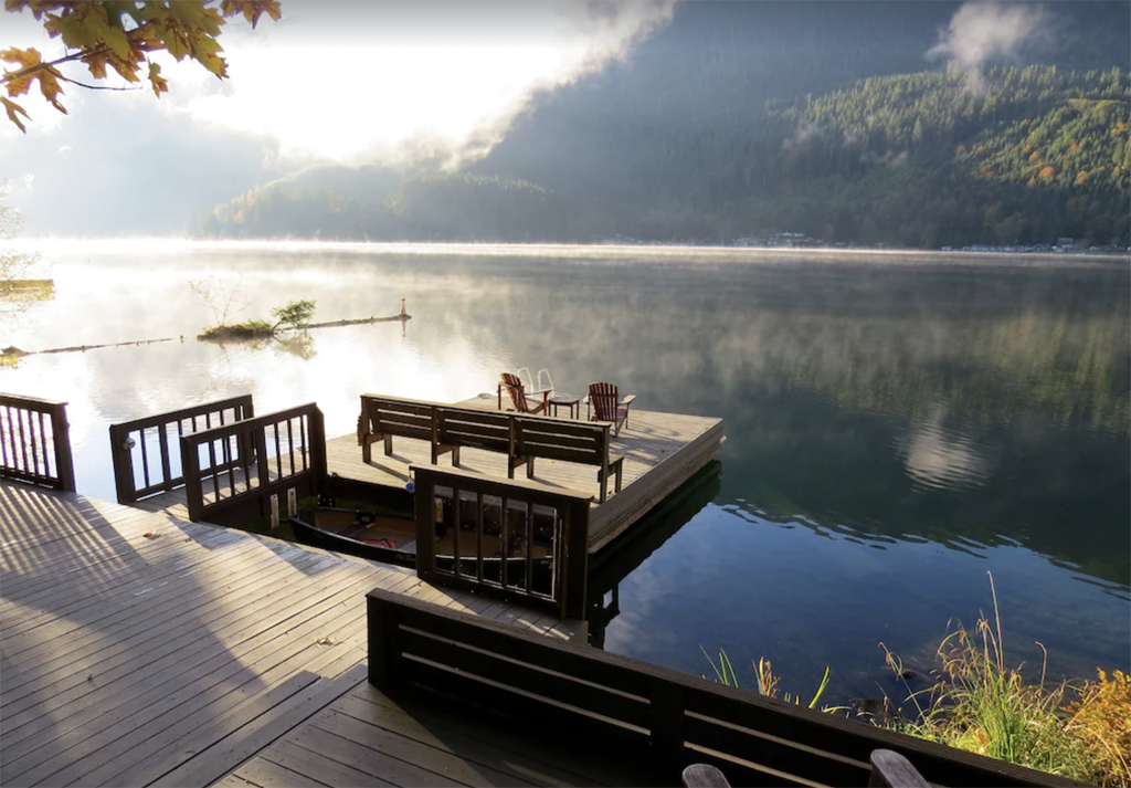 dock overlooking a misty lake