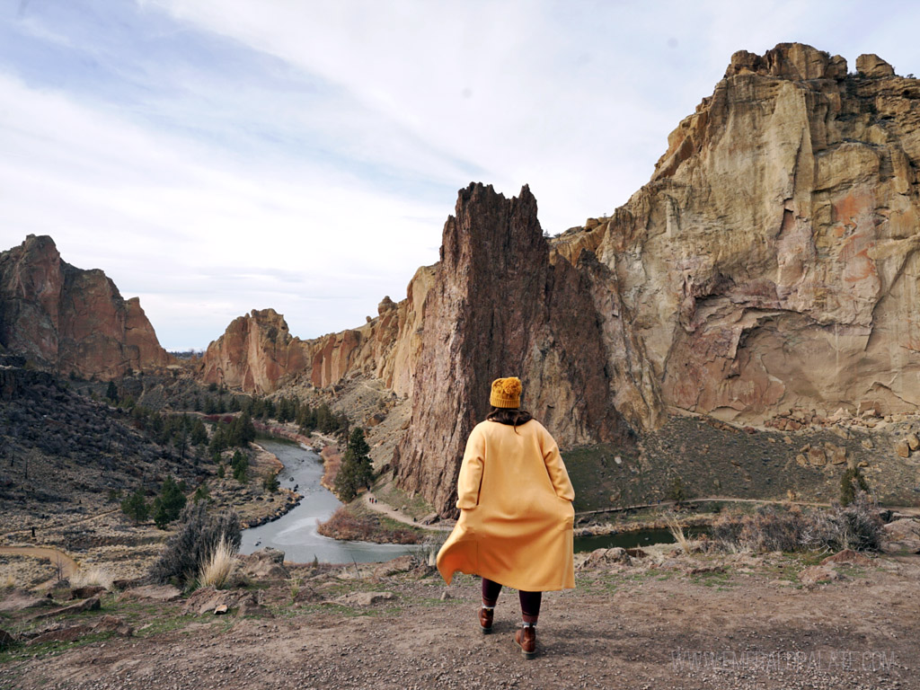 person walking among rock formations in a state park, one of the best road trips from Seattle