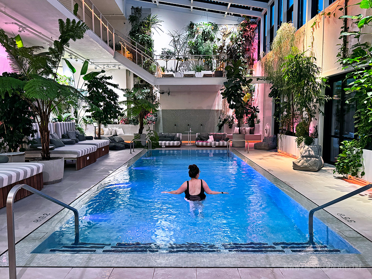 woman swimming in an indoor pool at a spa hotel in Oregon
