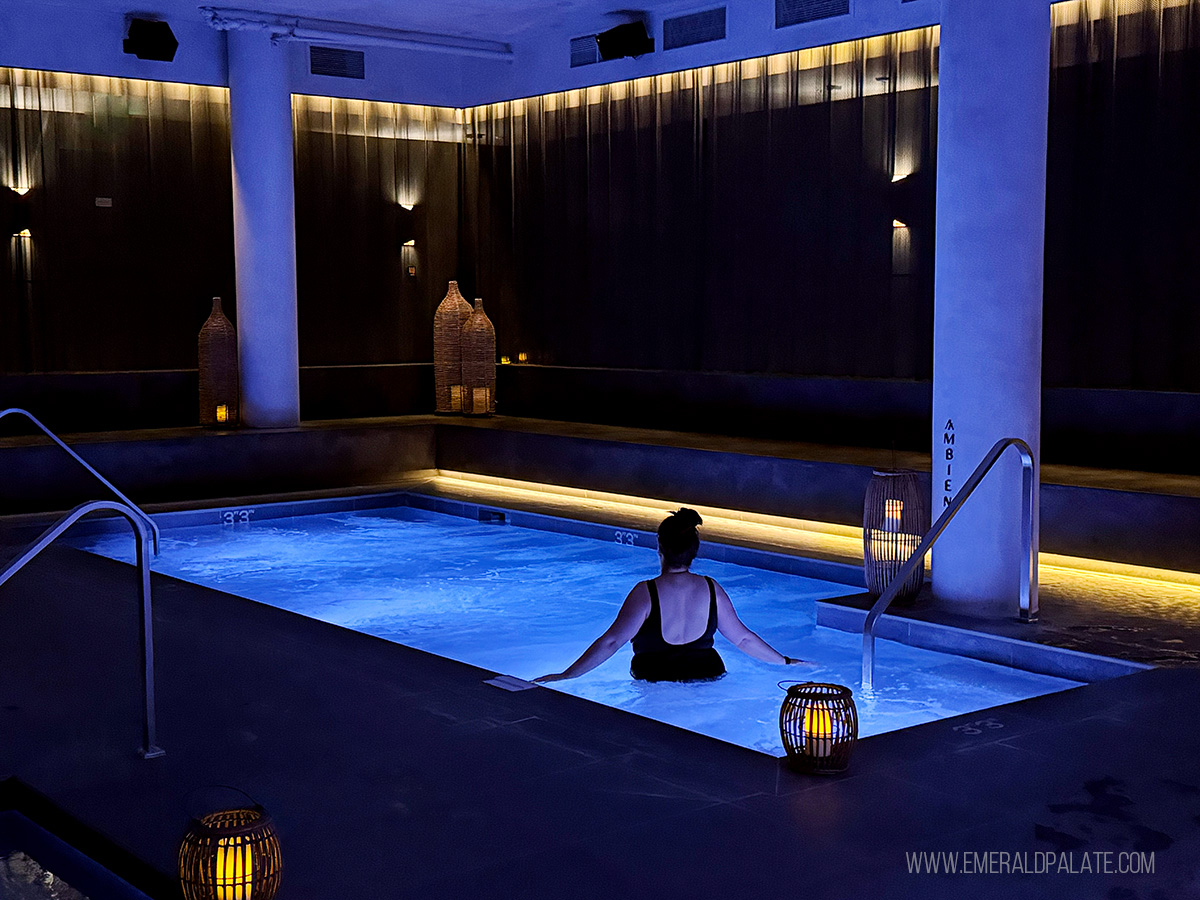 woman relaxing in a thermal pool at one of the most unique places to stay in Oregon