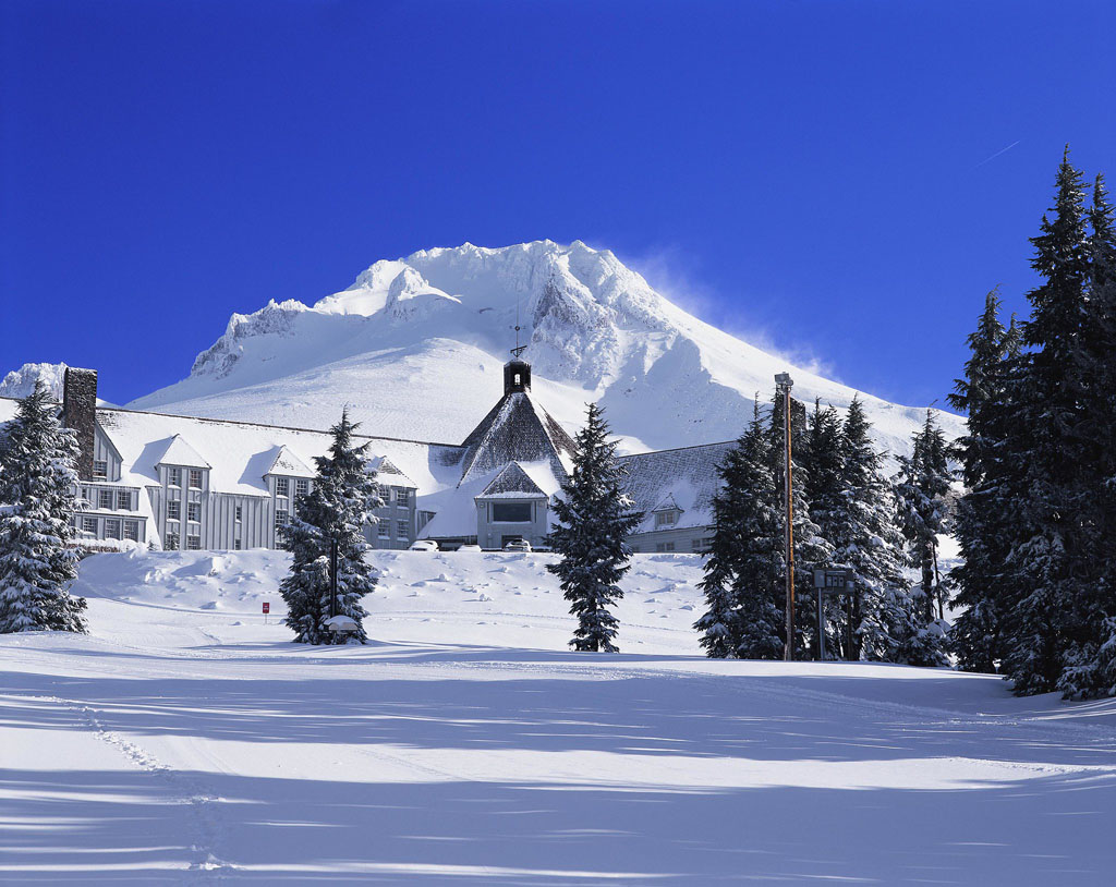 Timberline Lodge in snow with Mt. Hood in the background