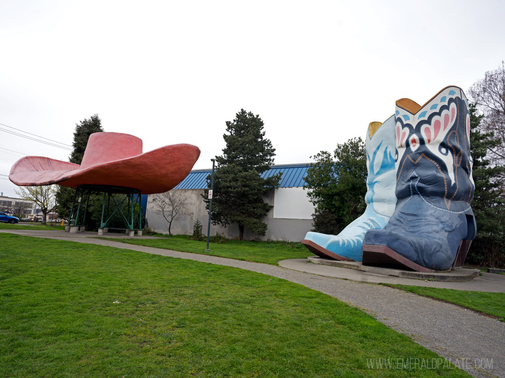 unique things to do in Seattle, like this cowboy hat and boots sculpture in a park