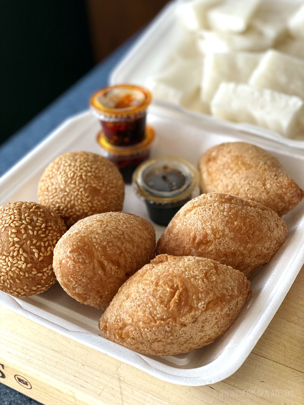 fried dumplings in a takeout container from a Seattle Chinese restaurant