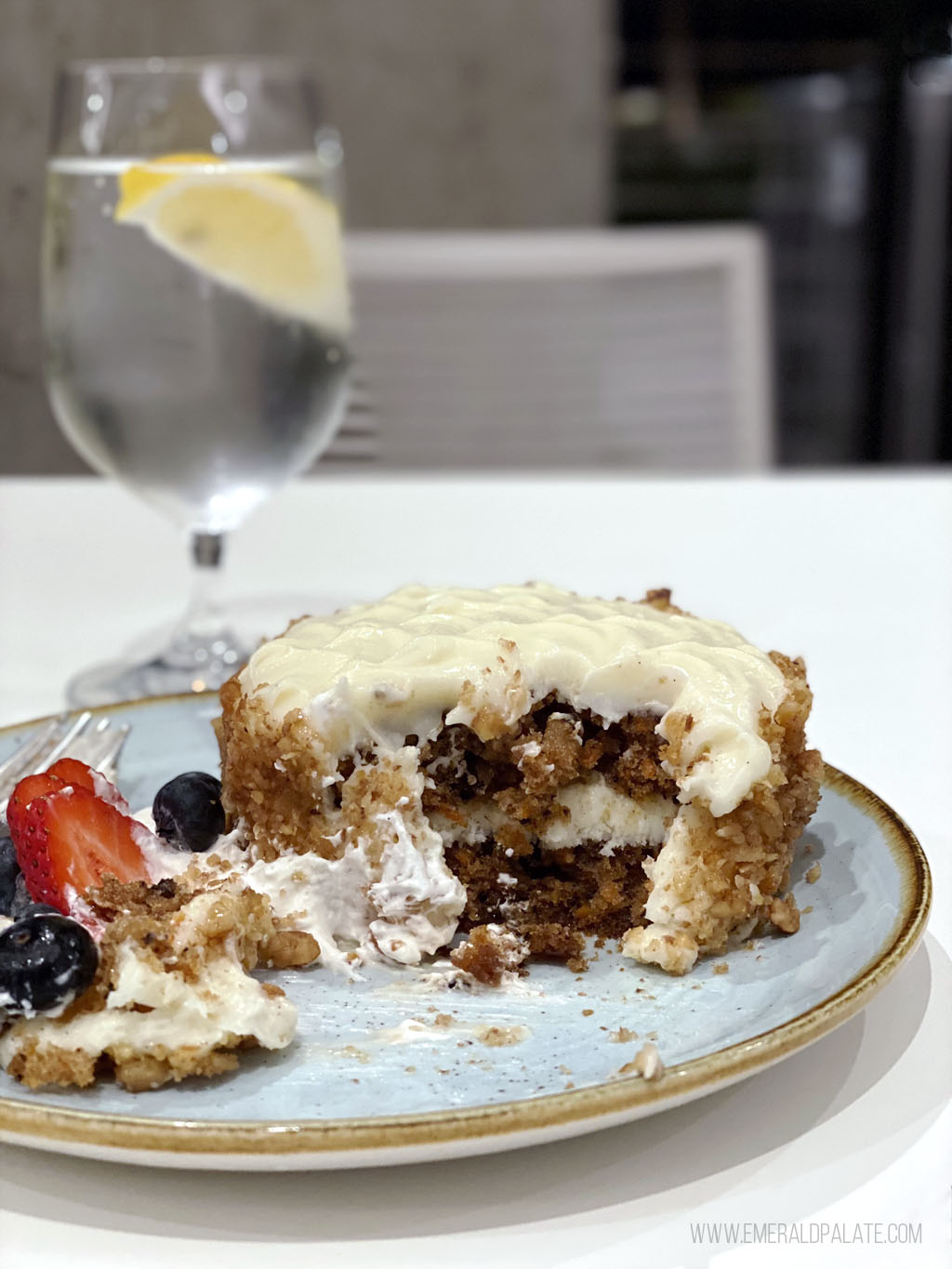 carrot cake with a few bites taken out of it