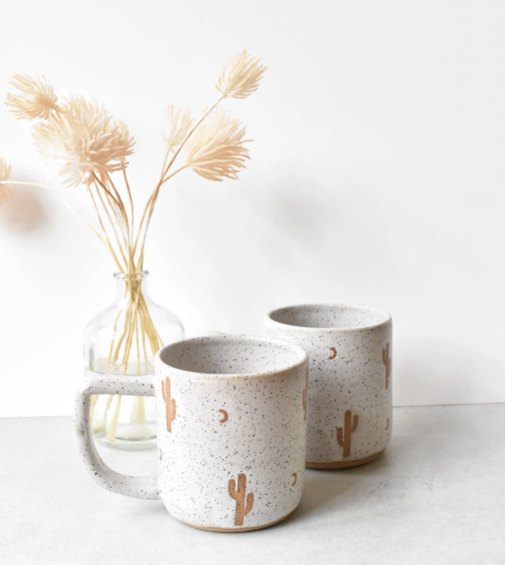 minimalist ceramic mug with cactus on it