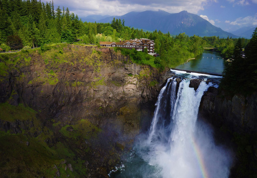 View of dog-friendly WA hotel perched on top of Snoqualmie Falls in Washington