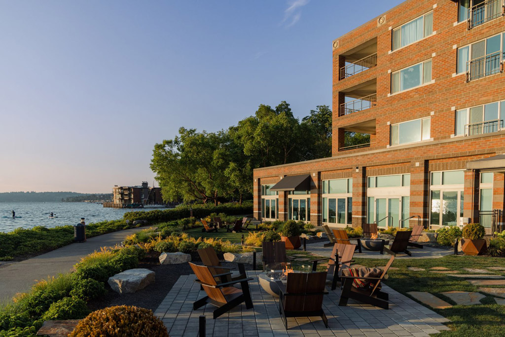 view of a hotel and its patio overlooking Lake Washington
