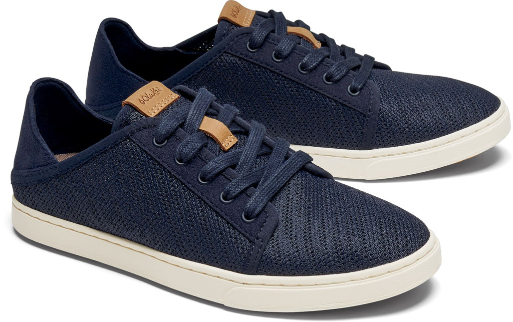 navy blue slip on travel sneakers with faux laces and mesh pattern