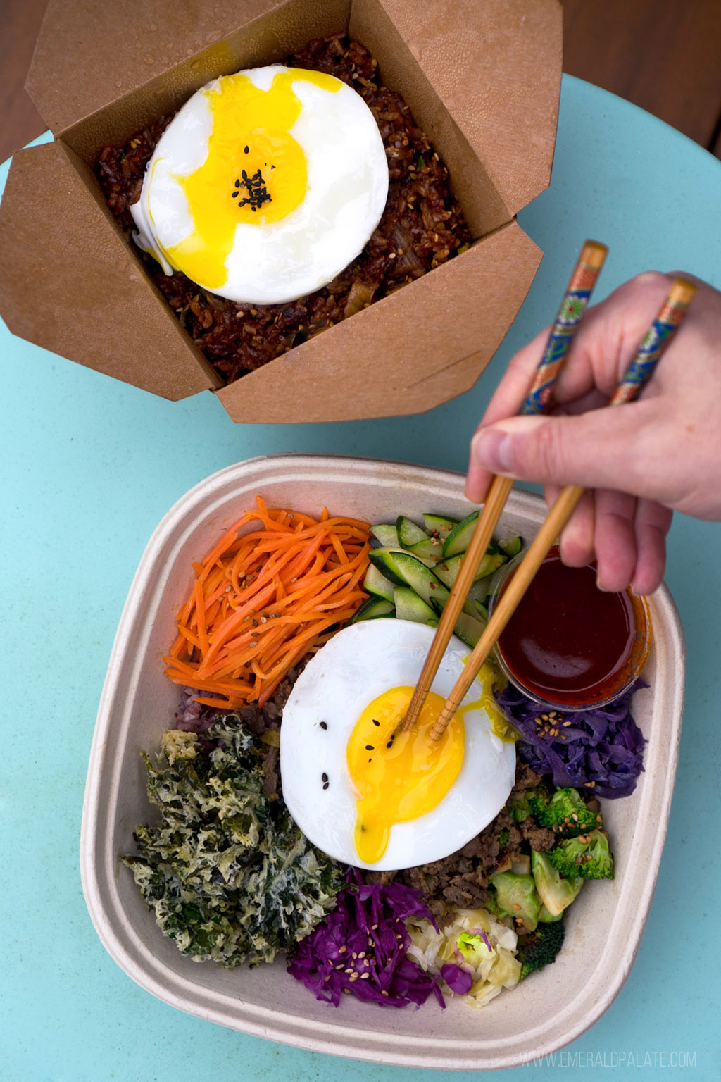 Korean food in takeout containers from one of the best Seattle lunch restaurants