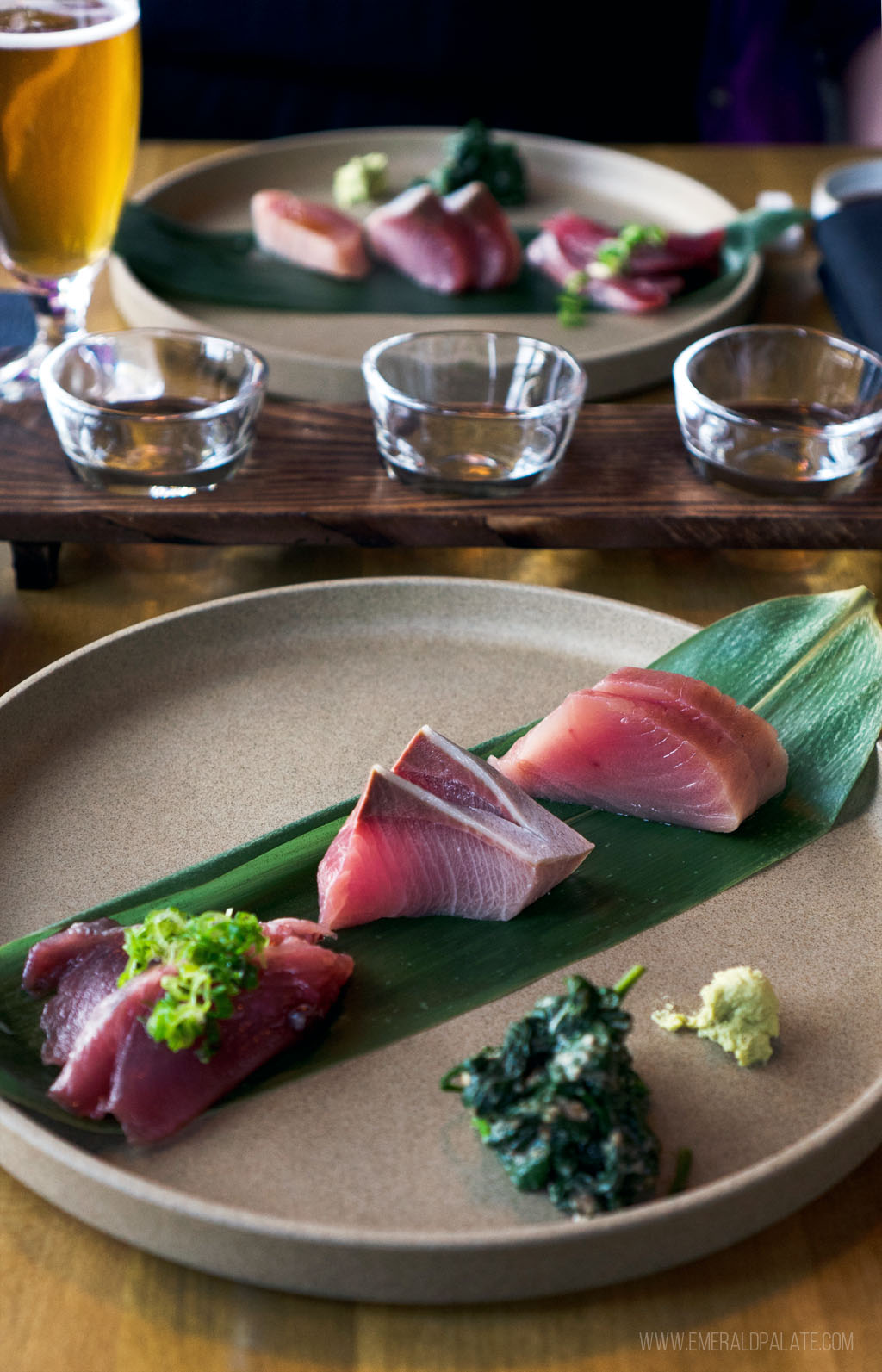 plate of 6 sashimi artfully arranged at one of the best sushi restaurants in Seattle