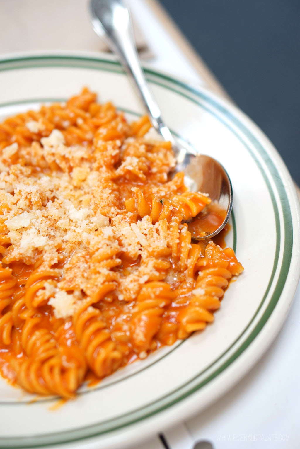 Fusilli pasta with vodka sauce and covered with cheese