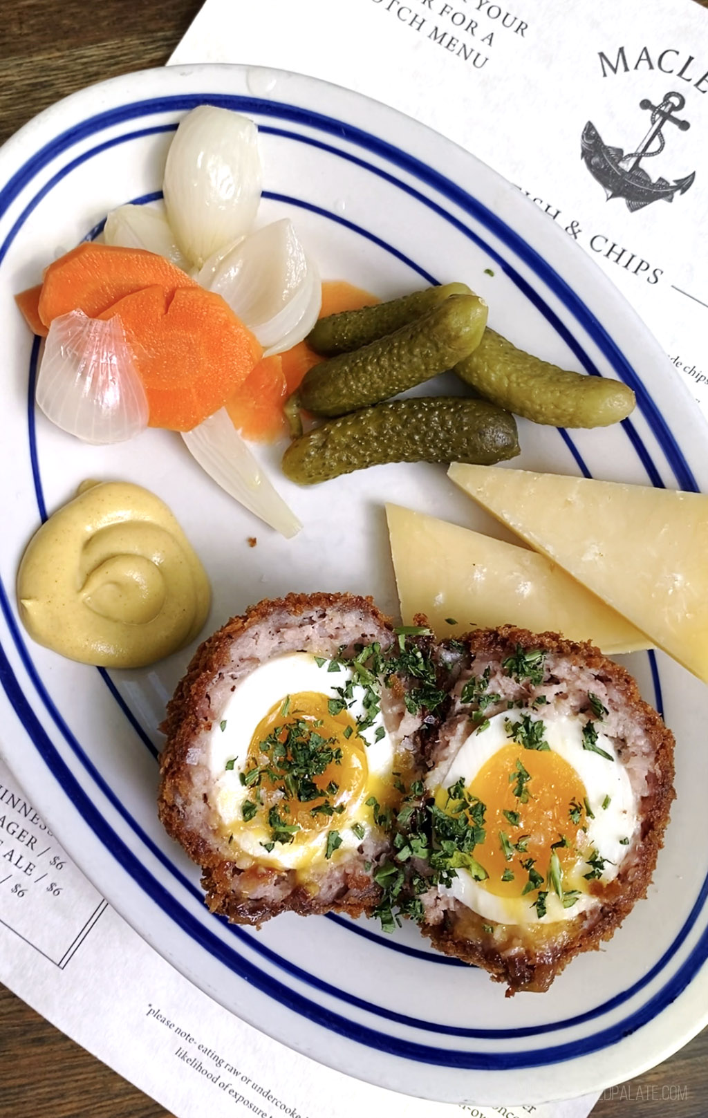 plate of Scotch egg and pickles