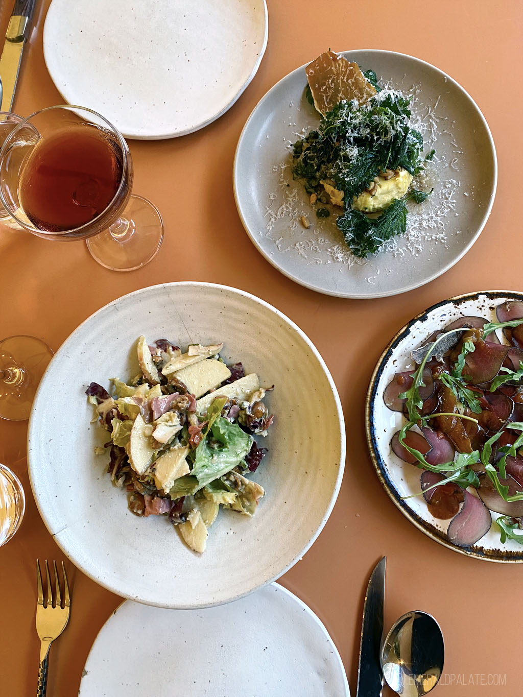 overhead shot of Italian dishes on a table