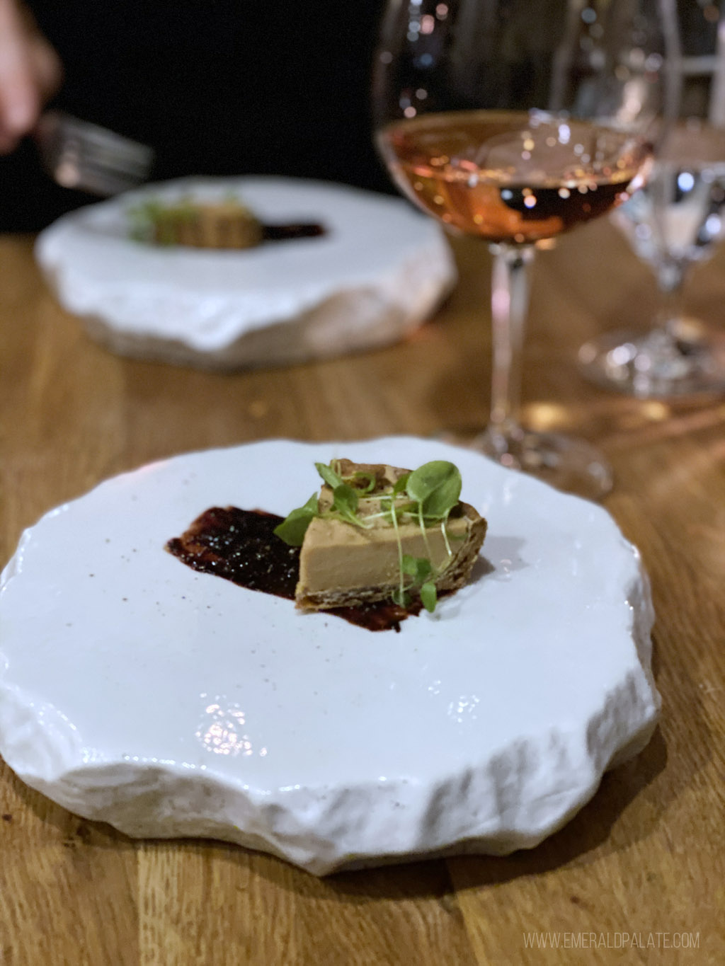foie gras bite on a fancy misshapen plate