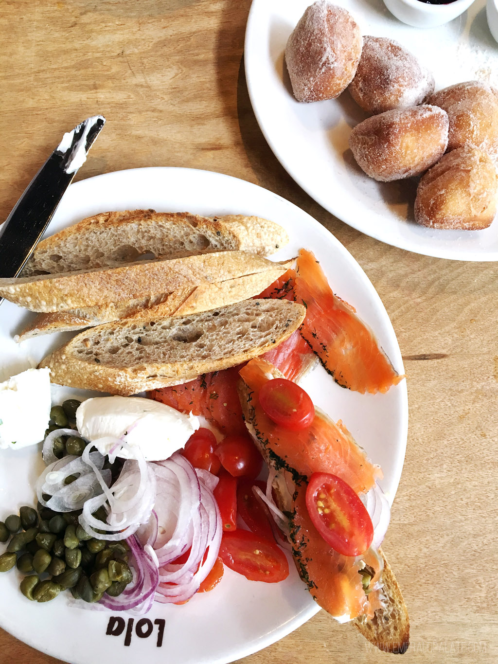 plate of gravlax and beignets