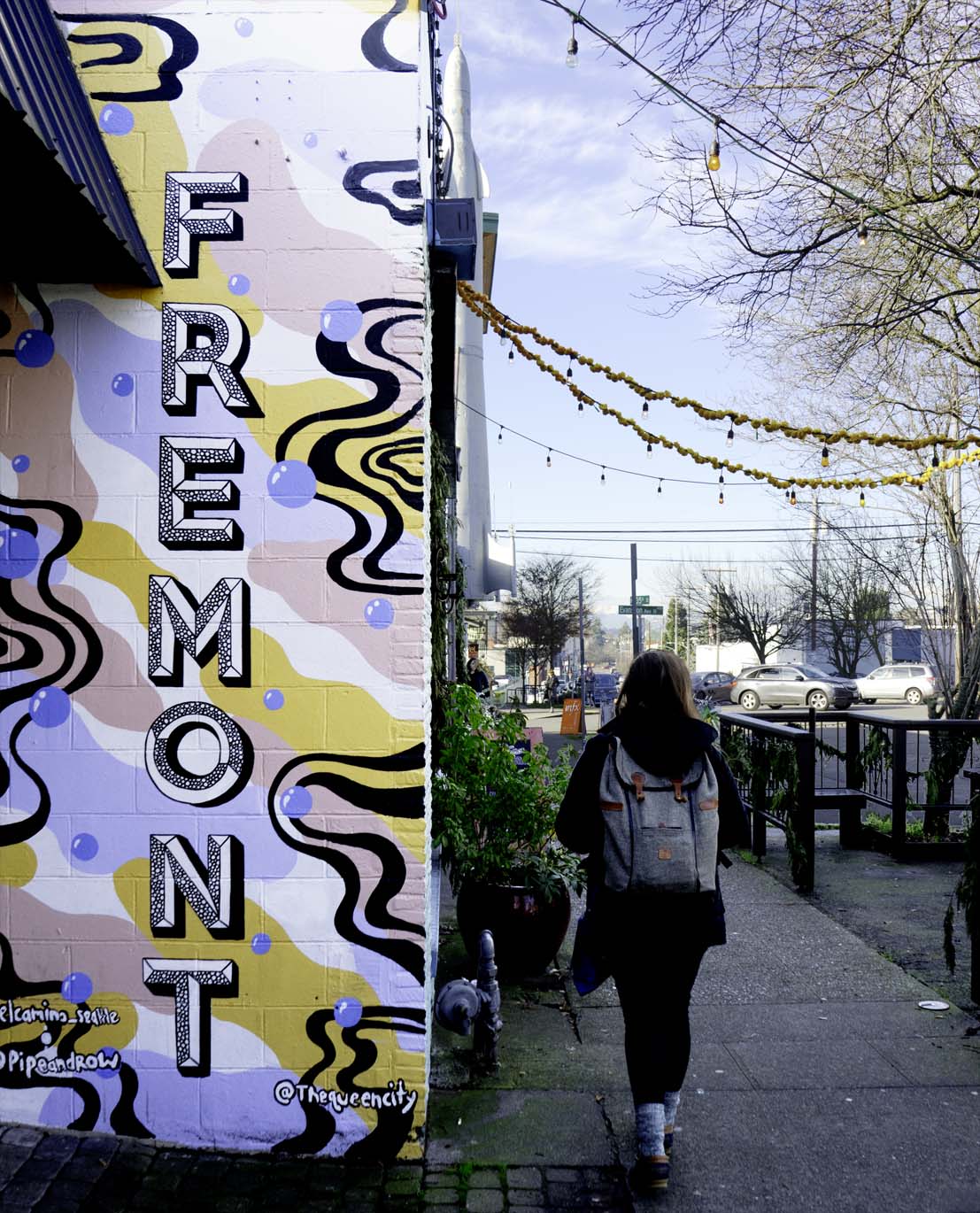 woman walking in downtown Fremont, one of the coolest neighborhoods in Seattle