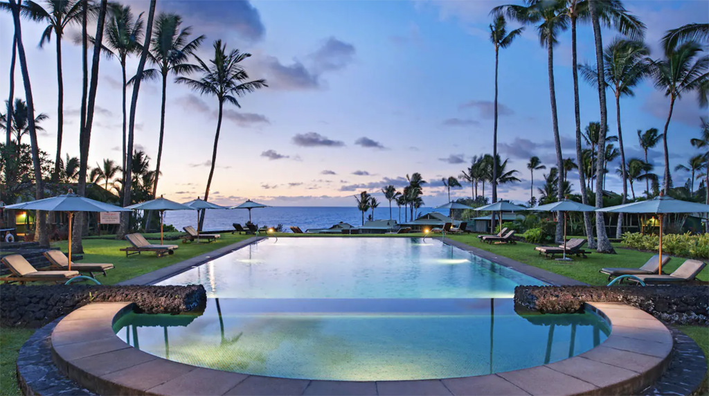 Luxurious infinity pool at a resort overlooking the ocean in Maui